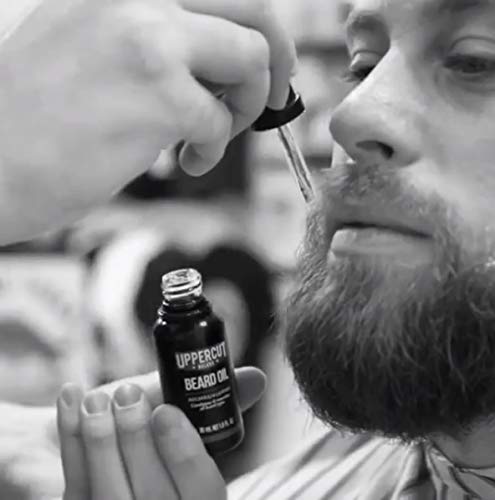 Uppercut Deluxe Beard Oil for Men, Lightweight Non-Greasy Beard Conditioner with Argan, Jojoba, Avocado & Rosemary Oils, Softens & Nourishes Beard, Patchouli Leather Scent, Beard Grooming Oil, 1 fl oz