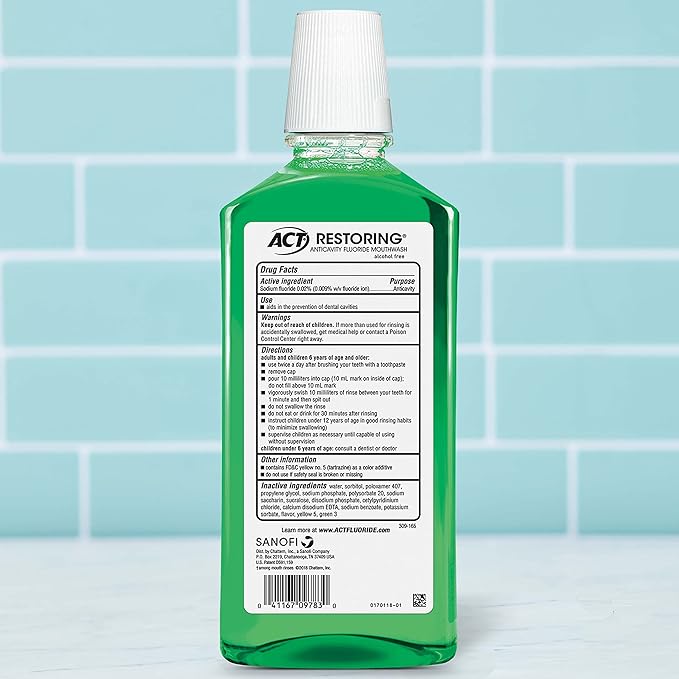 ACT Restoring Zero Alcohol Fluoride Mouthwash 33.8 fl. oz. Strengthens Tooth Enamel, Mint Burst (Pack of 2)