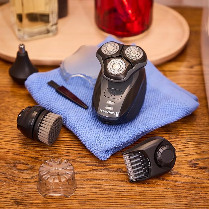 Remington Balder™+ Head Shaver 3 Dual-Track Cutting Heads Multi-Directional Pivot 45 Minute Run Time 100 Percent Waterproof Complete Grooming Kit with Beard Trimmer Nose and Ear Trimmer